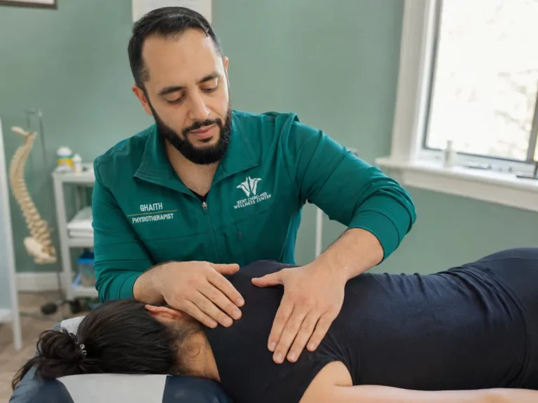 Ghaith Dhaidan Practitioner treating mid back and shoulder pain at Kent Chiro Med Wellness Clinic in Ottawa