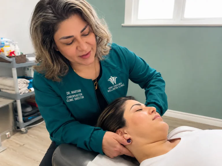 Maryam Chiropractor providing head and neck pain relief treatment at Kent Chiro Med Wellness Clinic in Ottawa